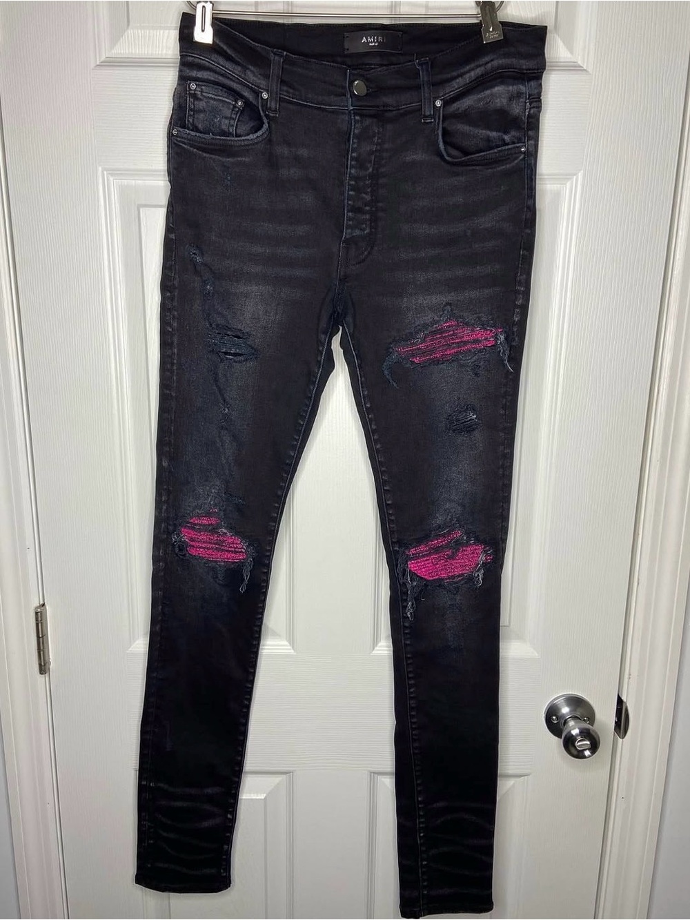 AMIRI Black Skinny Jeans with Pink Patch Distress